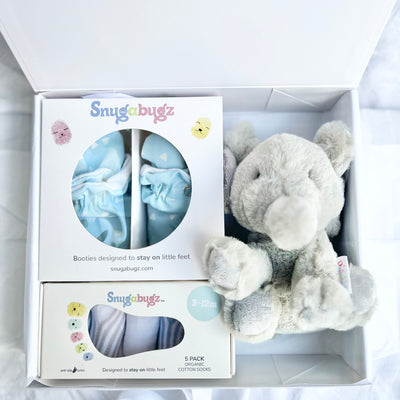 Luxury baby Gift Box Set Containing Snugabugz Blue Booties with non-slip soles and organic cotton Baby Socks That Stay On with Elephant Plush soft toy in magnetic keepsake box